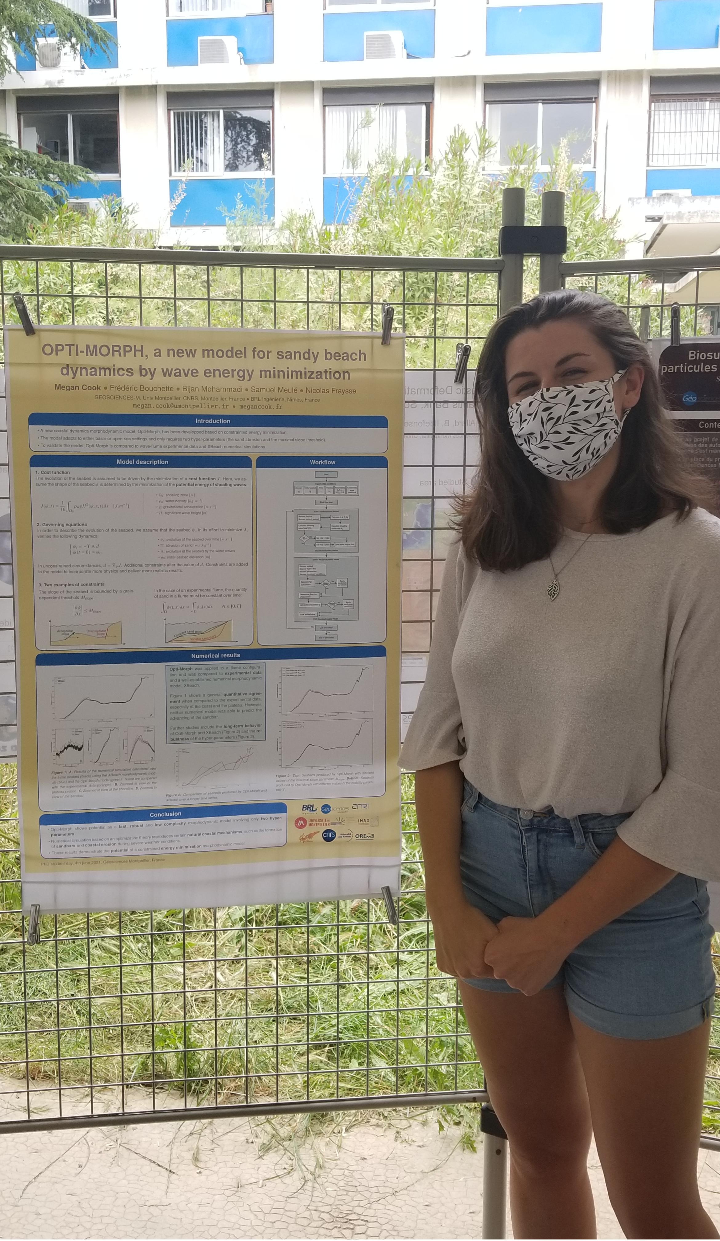 photo of me in front of my poster at the PhD student day, organized by Géosciences Montpellier